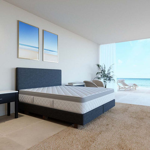Excellence Matratze 1000+ auf modernem Boxspringbett in stilvollem Schlafzimmer für ergonomischen Liegekomfort und erholsame Nächte.